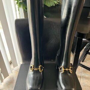 Black Tall Boots with Gold Accents